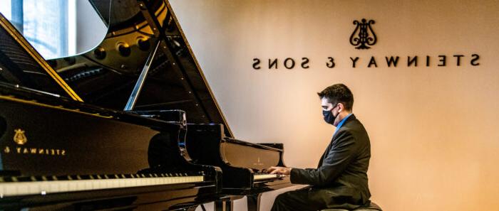 Luis Sanchez playing piano